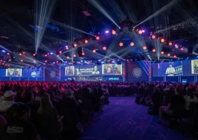 Funnelhacking Live - a large business or marketing event, identified by the visible text and large screens showing speakers